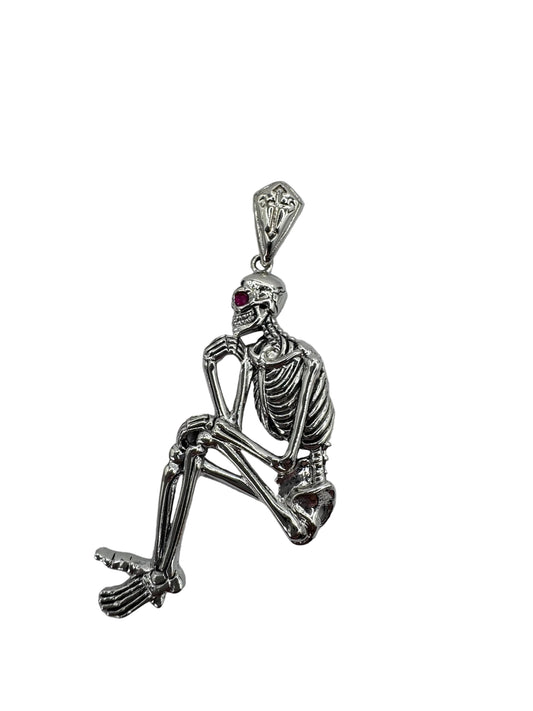 Sterling Silver Sitting Skeleton Pendant w/Ruby Eye