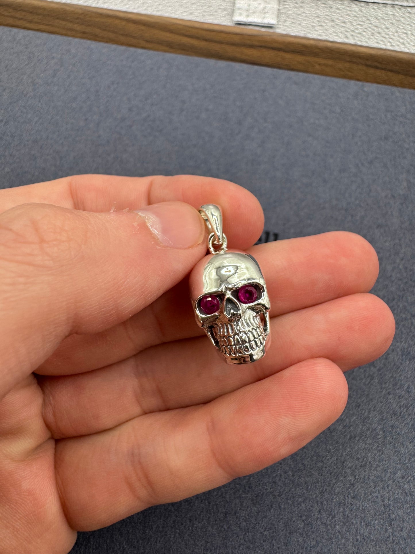 Sterling Silver Skull Pendant w/ Ruby Eyes