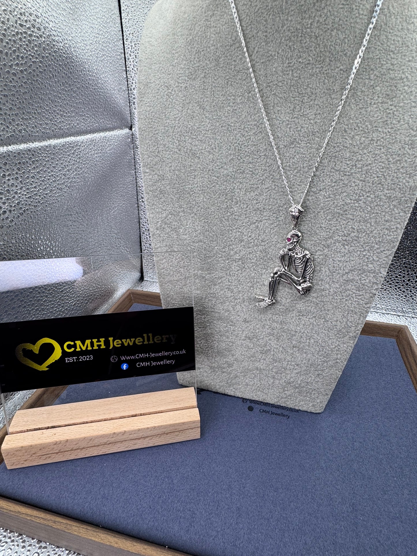 Sterling Silver Sitting Skeleton Pendant w/Ruby Eye