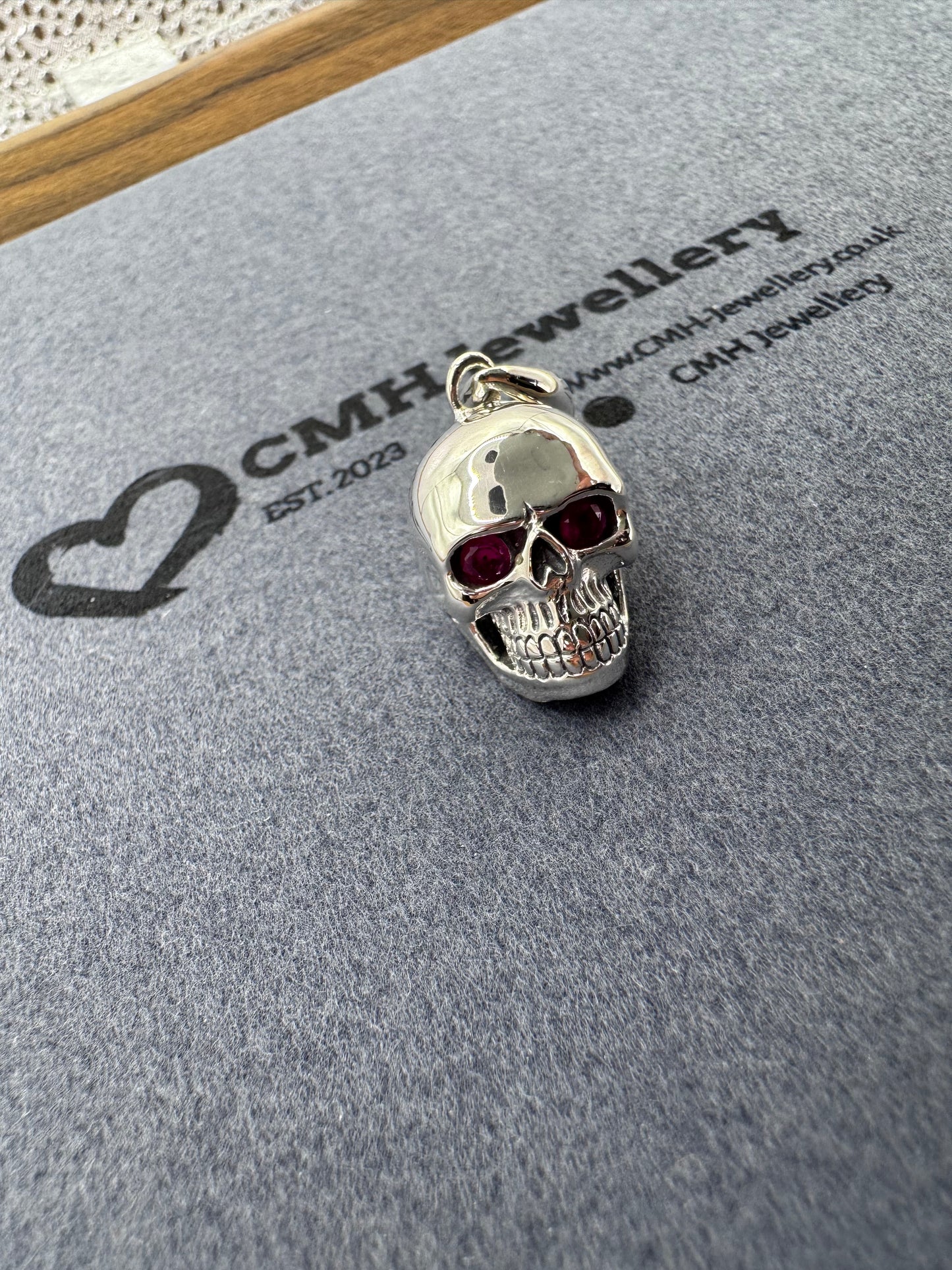 Sterling Silver Skull Pendant w/ Ruby Eyes